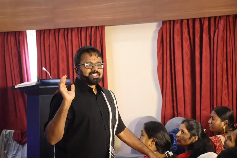 Guruji interacting with audience members